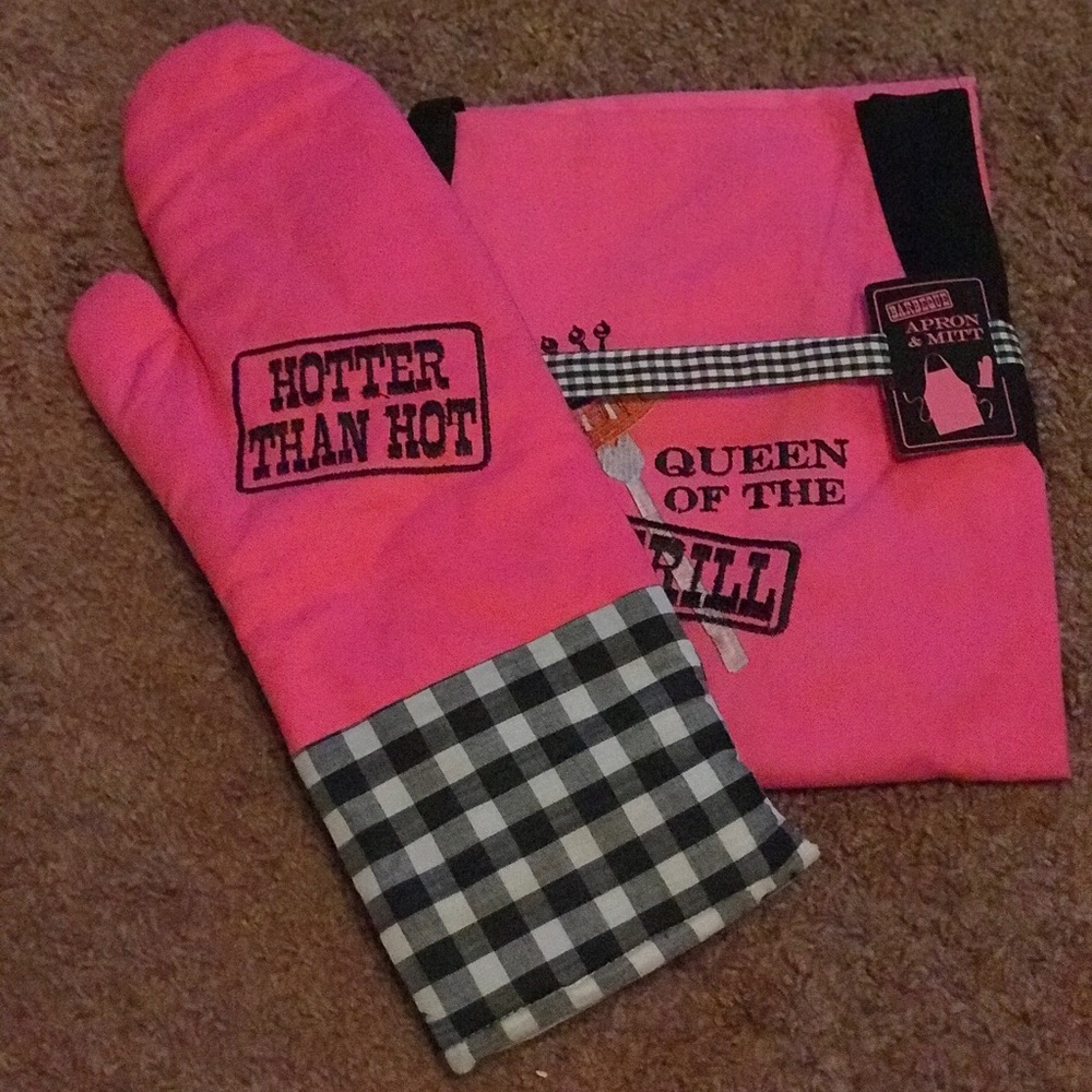 Brand new...not in packing material. Apron and Mitt set